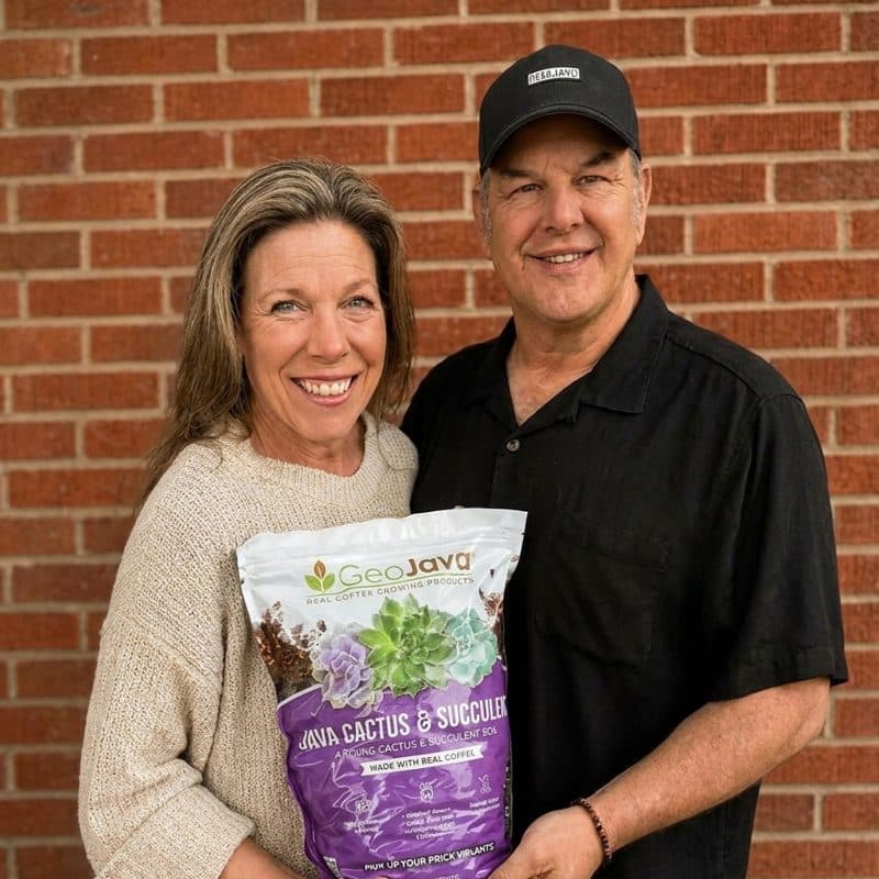 David and Heather Mayer holding a bag of GeoJava potting mix